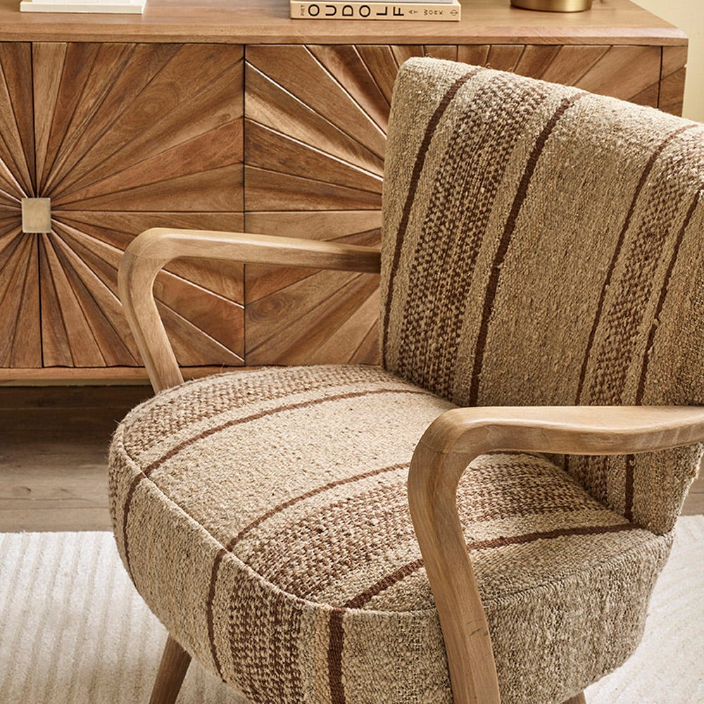 CALVIN IN BROWN STRIPED RUG