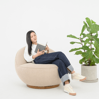 MOLLY SWIVEL CHAIR IN CURLED FABRIC