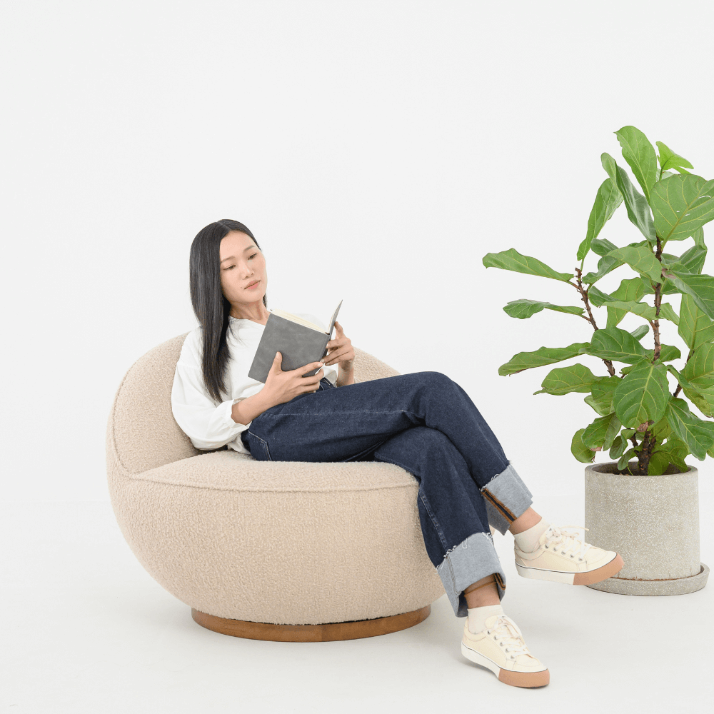 MOLLY SWIVEL CHAIR IN CURLED FABRIC