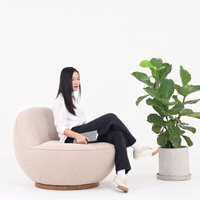 MOLLY SWIVEL CHAIR IN CURLED FABRIC