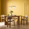 Atkin and Thyme Cora Dining Chair in Neutral Boucle Styled Room Light On 
